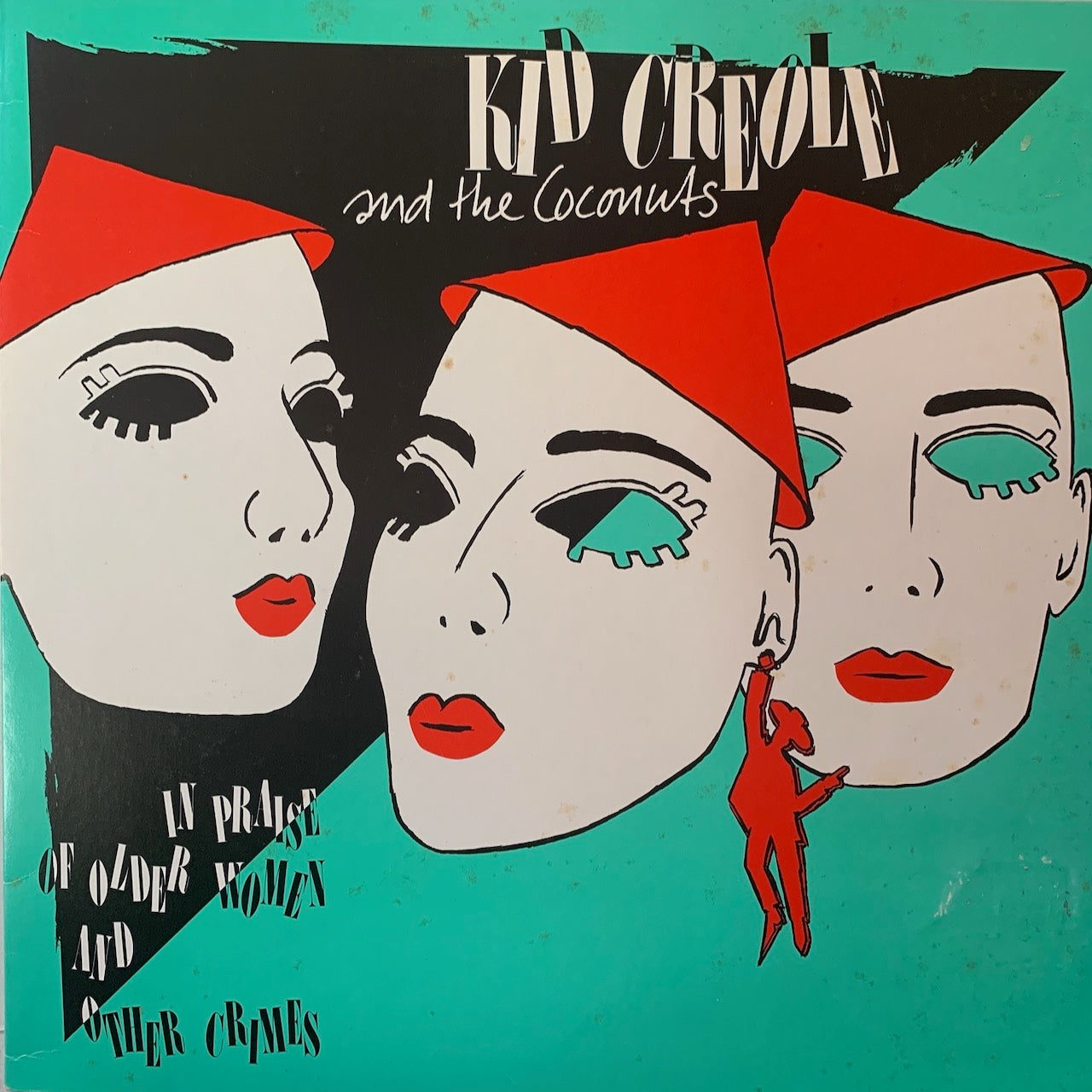 KID CREOLE AND THE COCONUTS - IN PRAISE OF OLDER WOMEN AND OTHER CRIMES    VG+/VG+ 1985  NO OBI